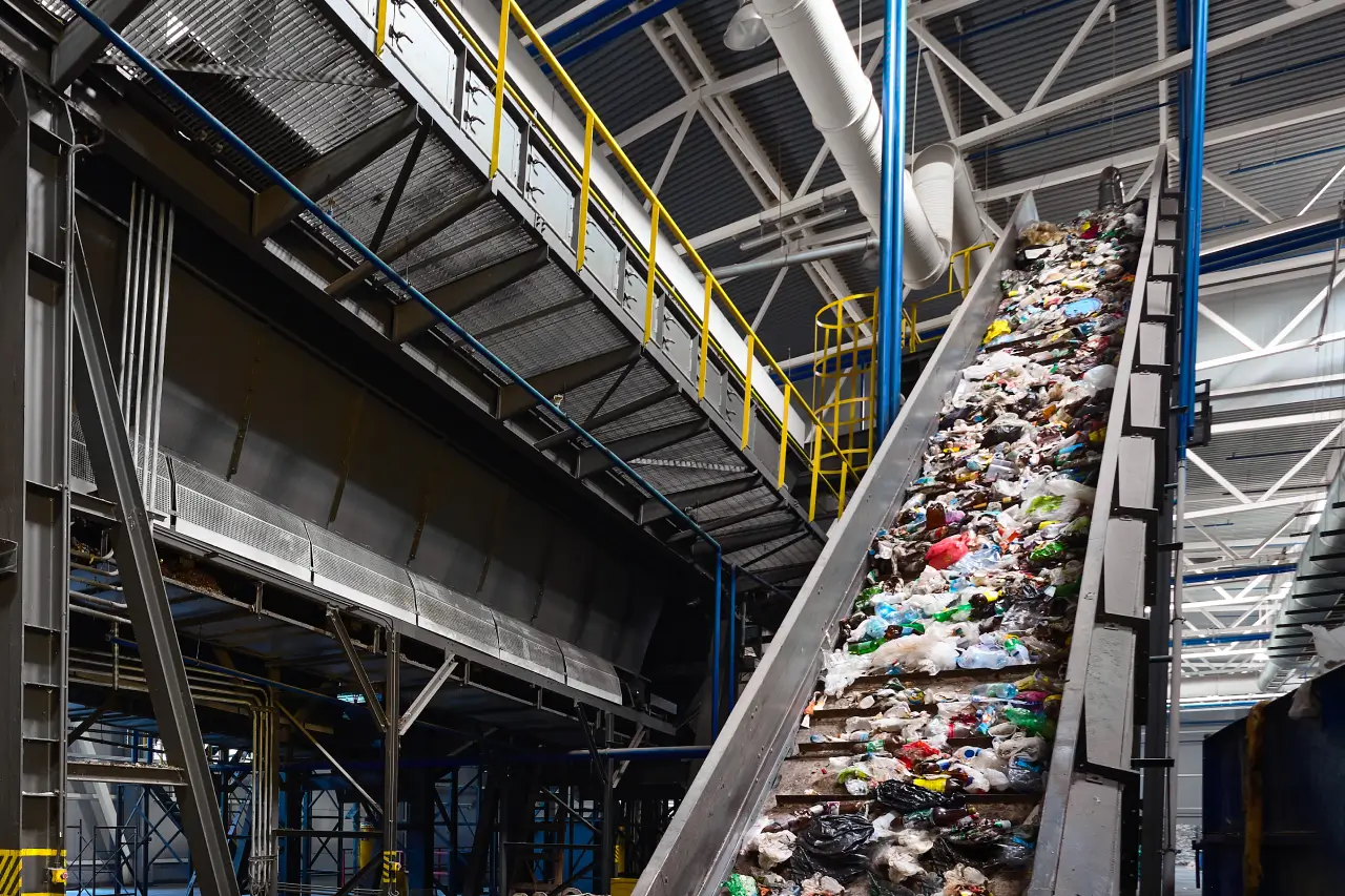 conveyor-belt-with-garbage-transports-waste-inside-drum-filter-or-rotating.webp