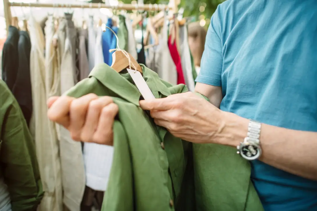 fashion-man-shopping-at-a-local-or-flea-market.webp