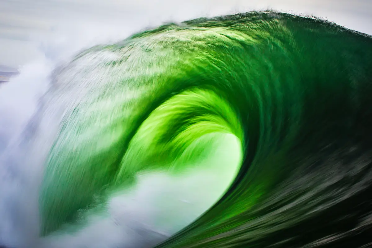 motion-blur-of-abstract-curling-green-ocean-wave.webp