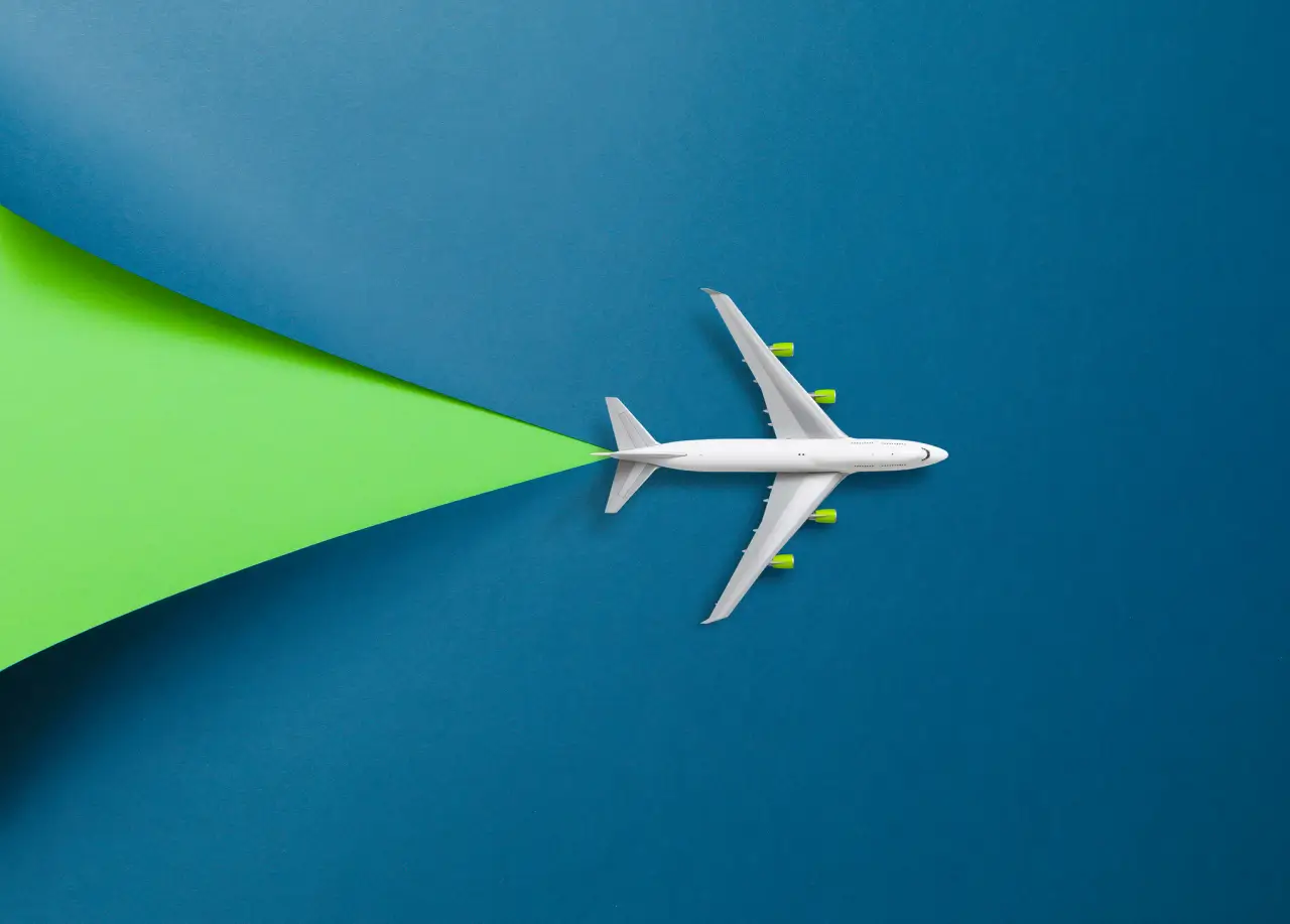 passenger-airplane-on-blue-background.webp